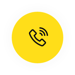 Yellow phone icon with receiver, symbolizing communication and contact.
